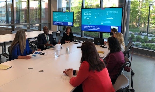 people at table meeting